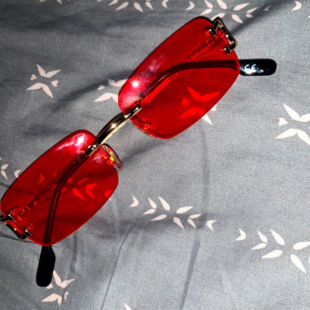 Cartier glasses red tint I just don’t have the case for it very new tho